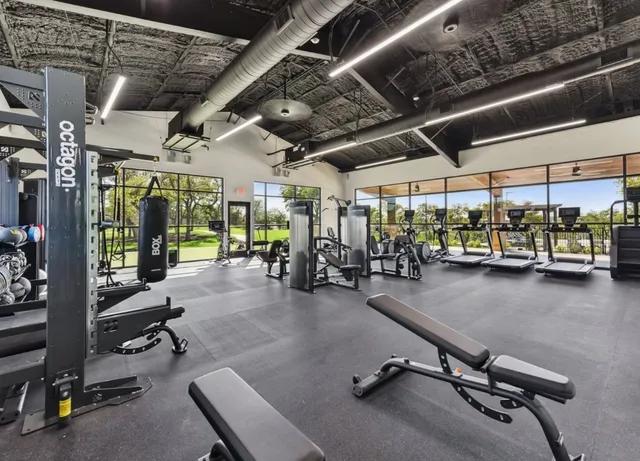 a view of a room with gym equipment