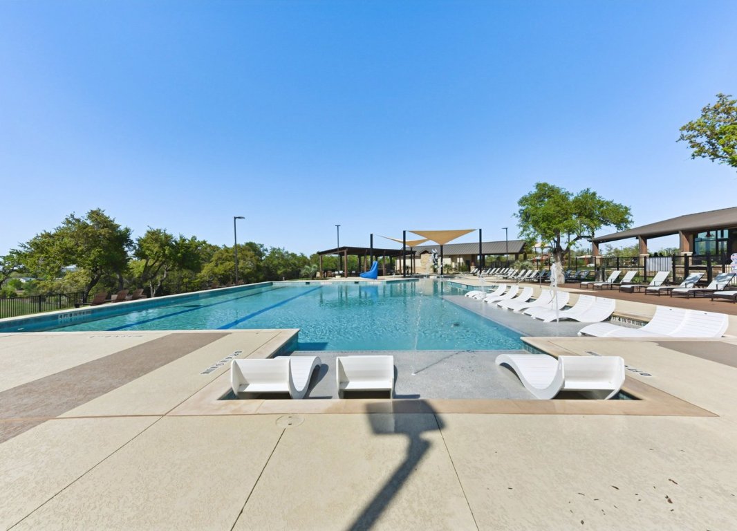 328 Buckaroo Drive Georgetown, TX 78633 - Photo 7 of 9 a view of a swimming pool with a patio