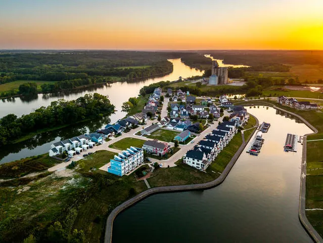 a view of a wooden deck with a yard