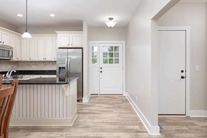9 Windward Way Ottawa, IL 61350 - Photo 22 of 56 a kitchen with stainless steel appliances granite countertop a refrigerator a sink and a stove