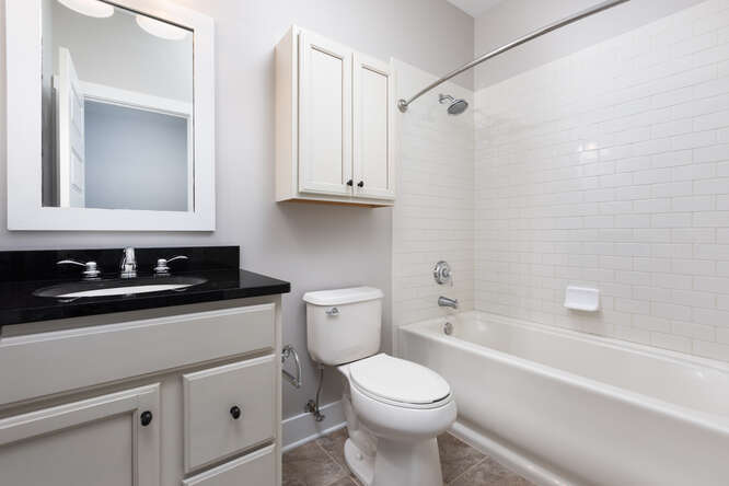 9 Windward Way Ottawa, IL 61350 - Photo 34 of 56 a bathroom with a sink a toilet and a bathtub