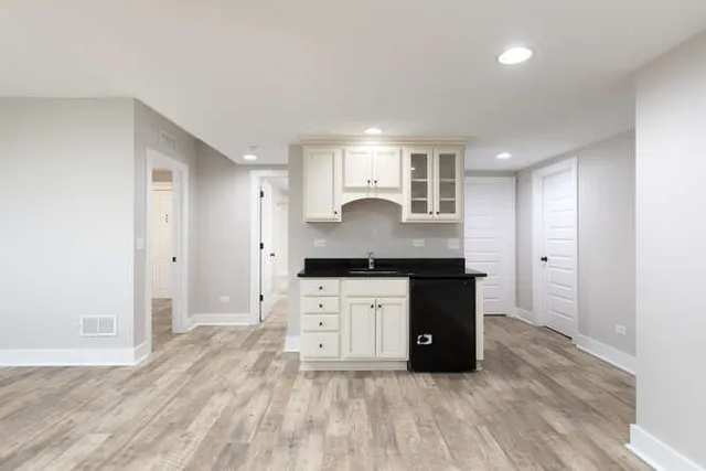 an aerial view of a house with a lake view