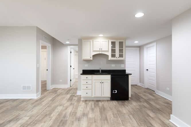 9 Windward Way Ottawa, IL 61350 - Photo 42 of 56 a kitchen with granite countertop a stove a sink and a refrigerator