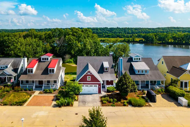 a view of a city with lawn chairs and a big yard