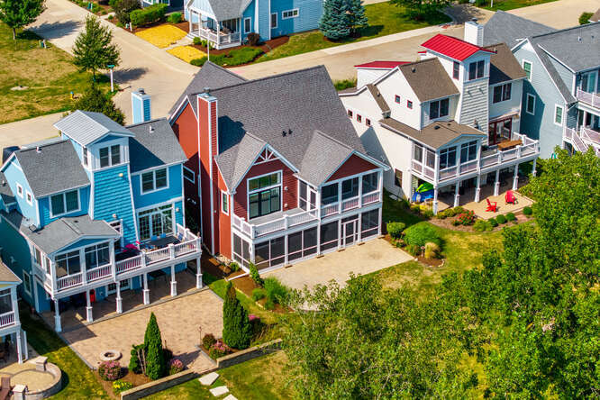 9 Windward Way Ottawa, IL 61350 - Photo 51 of 56 an aerial view of residential houses with yard and swimming pool