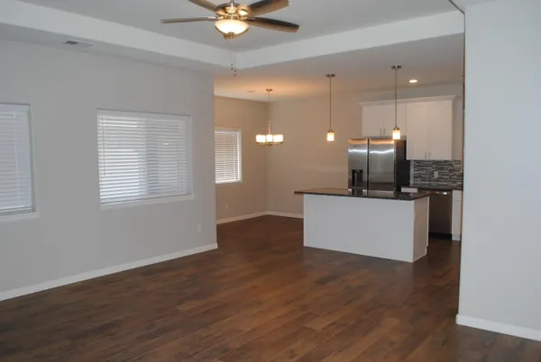 a view of a kitchen with marble kitchen and a sink