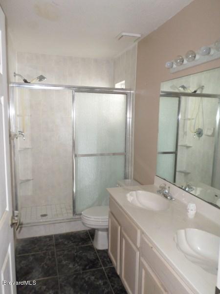 1789 Palm Ridge Road Melbourne, FL 32935 - Photo 7 of 11 Master Bathroom
