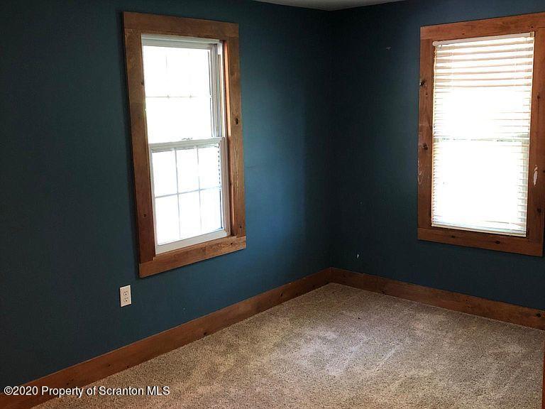 6197 Spring Hill Road Wyalusing, PA 18853 - Photo 14 of 15 a view of a room that has a window in it