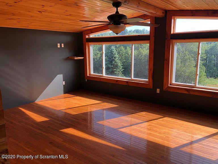 6197 Spring Hill Road Wyalusing, PA 18853 - Photo 9 of 15 a view of an empty room with a window