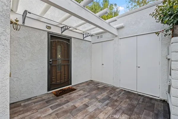 a view of a room with wooden walls