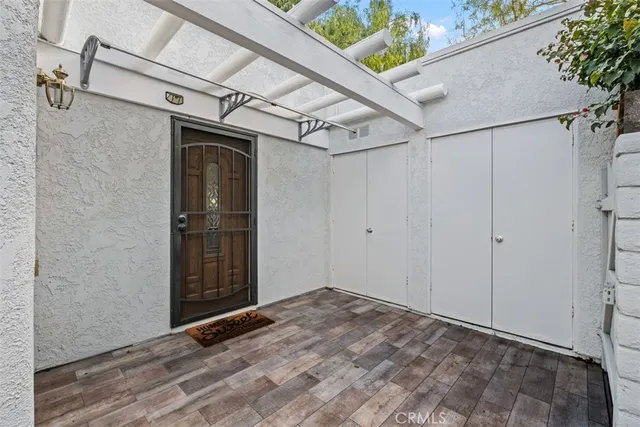 a view of a room with wooden walls