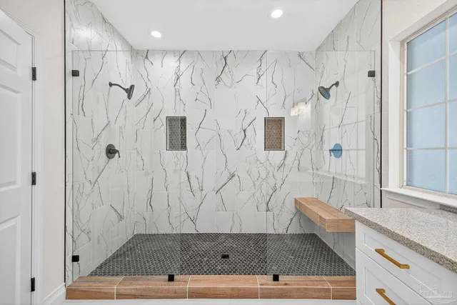 a view of a bathroom from the hallway