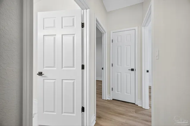 a bathroom with a double vanity sink and mirror