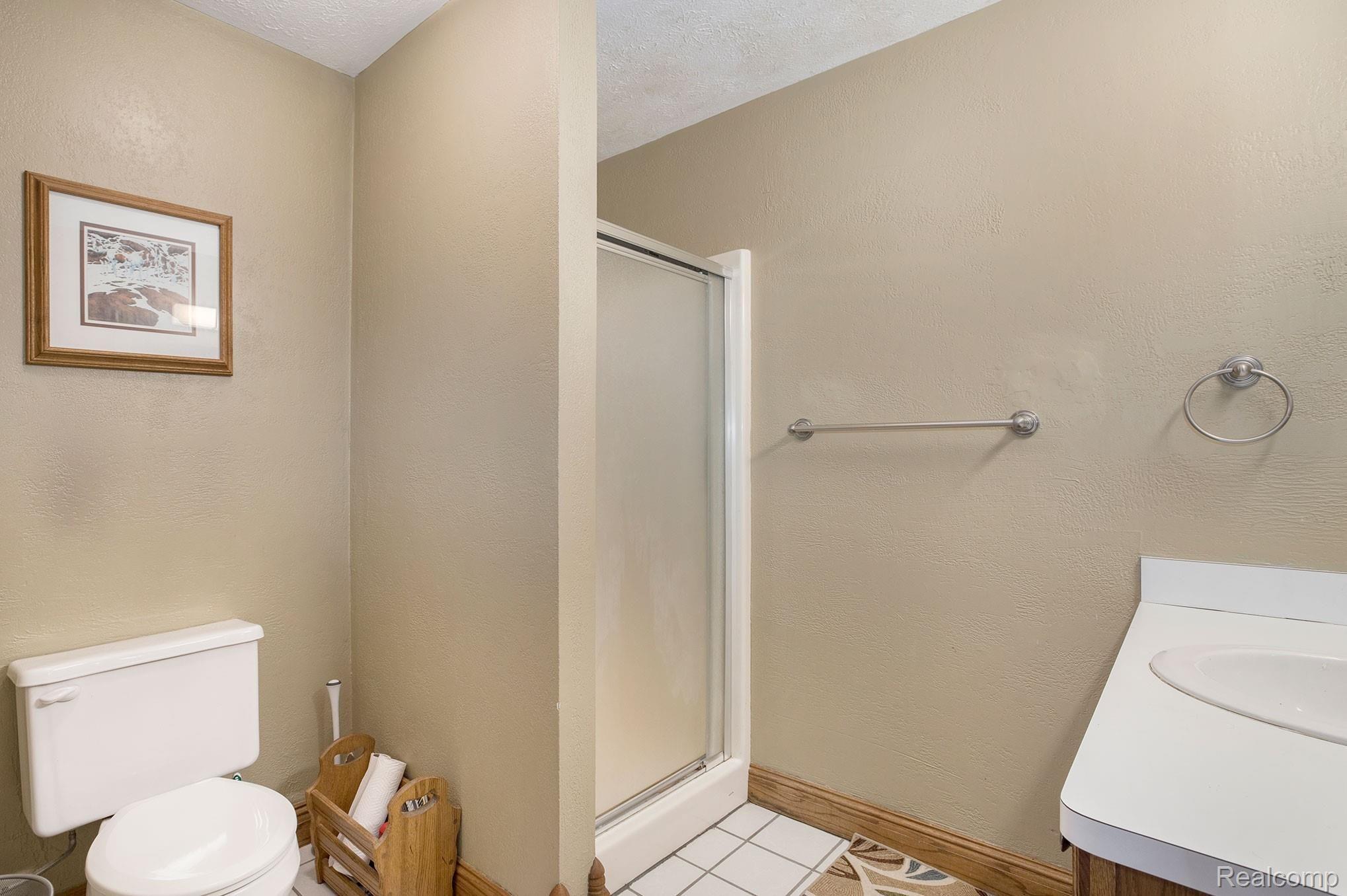 699 East Davis Road Howell, MI 48843 - Photo 26 of 42 Basement Full Bathroom