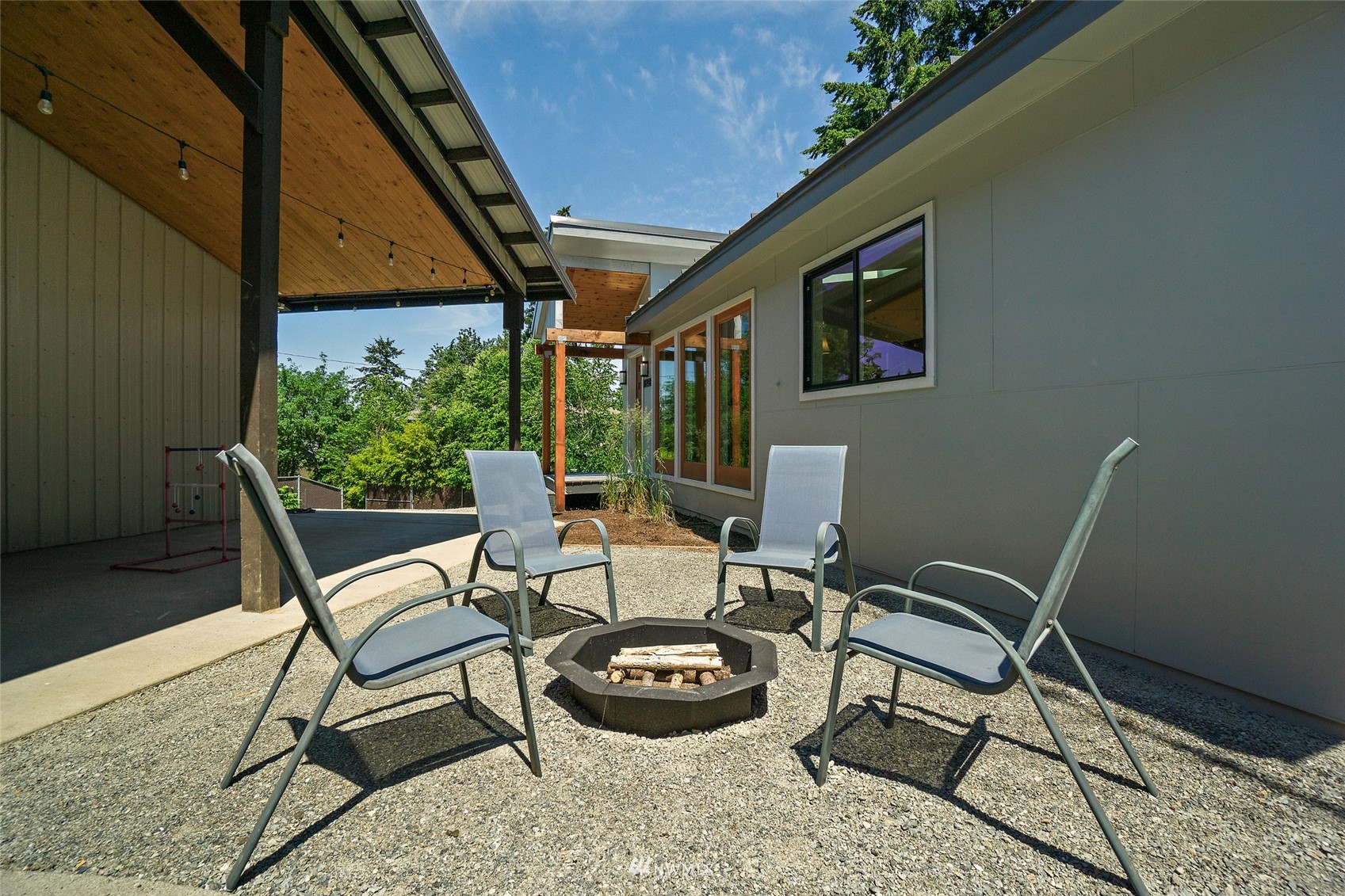 16438 Simonds Road Northeast Kenmore, WA 98028 - Photo 34 of 40 a view of a chairs and table in the balcony