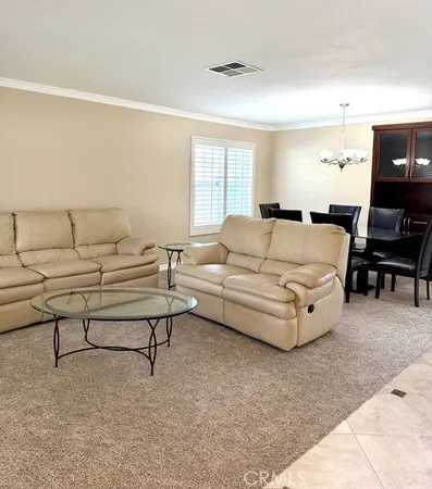 a bedroom with a bed and furniture