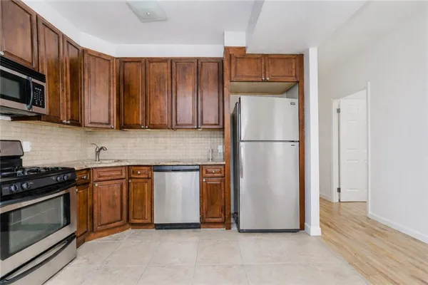 $959,000 | 8409 19th Avenue, Unit 3C | Van Pelt Manor