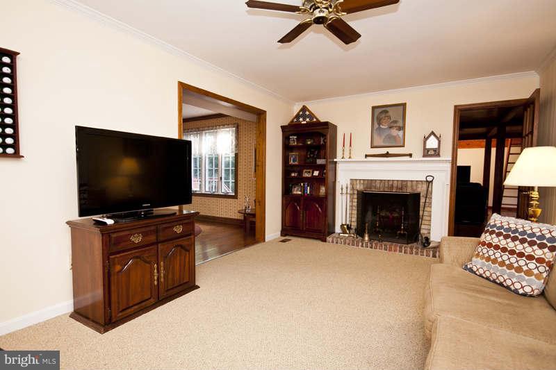 9014 Satyr Hill Road Baltimore, MD 21234 - Photo 9 of 28 Den with Fireplace
