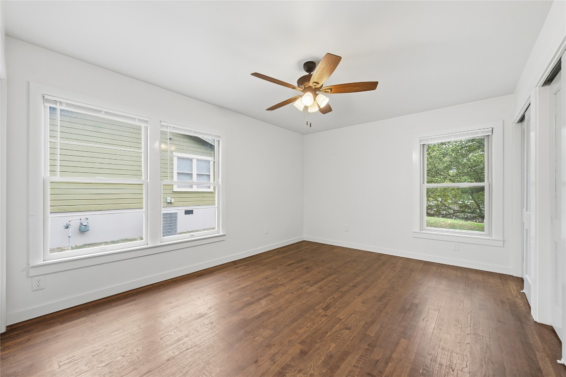 1003 Cogbill Street, Unit 1 Austin, TX 78745 - Photo 10 of 15 a view of empty room with wooden floor and fan