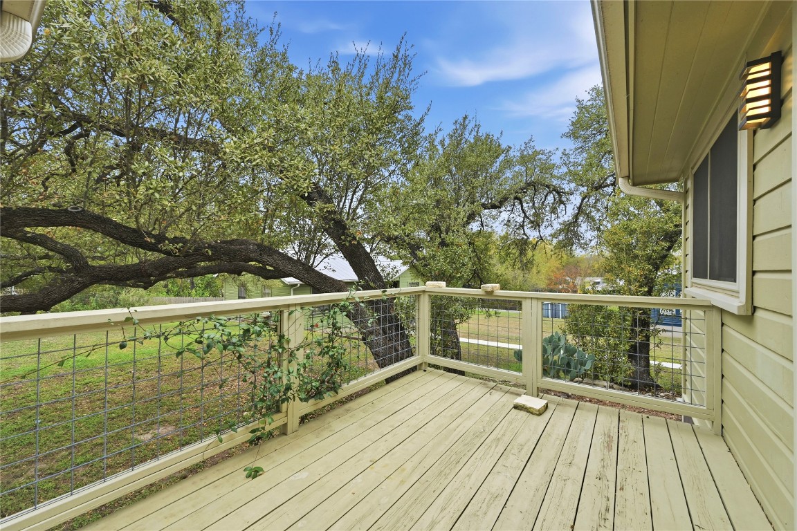 1003 Cogbill Street, Unit 1 Austin, TX 78745 - Photo 13 of 15 a view of a balcony with wooden floor