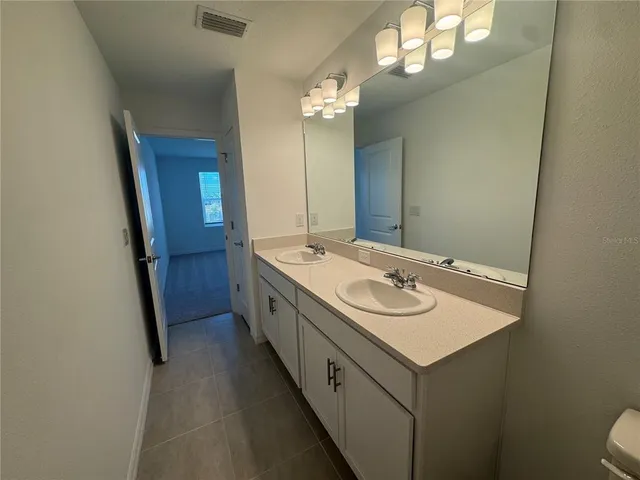 a view of a hallway with a white walls