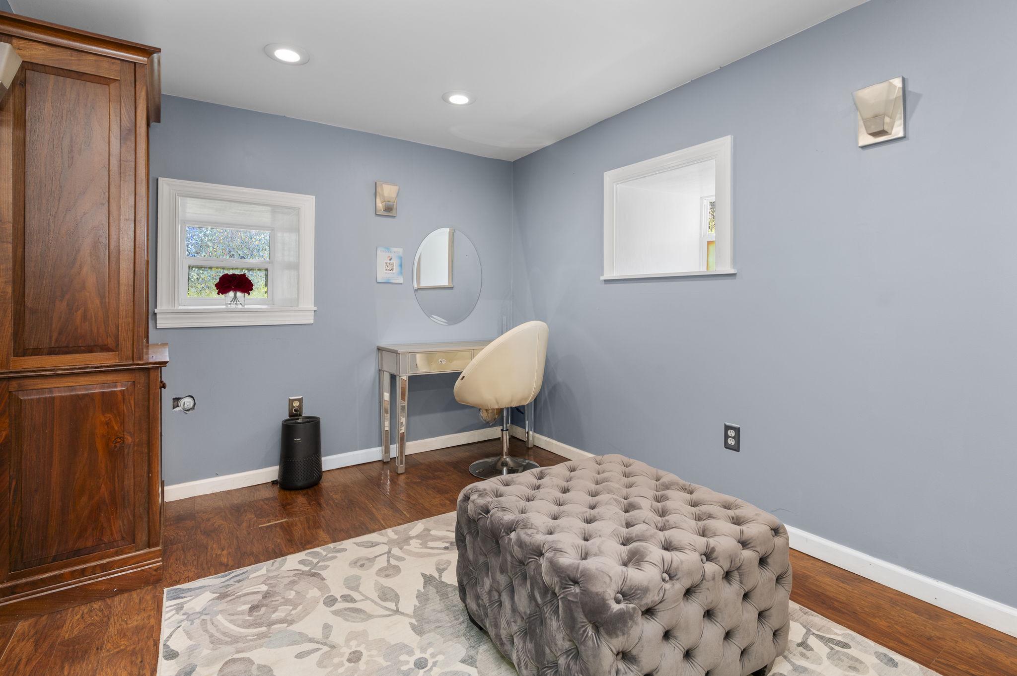 416 Snyder Road Reading, PA 19605 - Photo 51 of 65 a bedroom with a bed and a chandelier