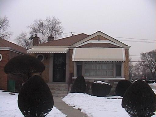 8800 South Merrill Avenue Chicago, IL 60617 - Photo 1 of 1 a front view of a house