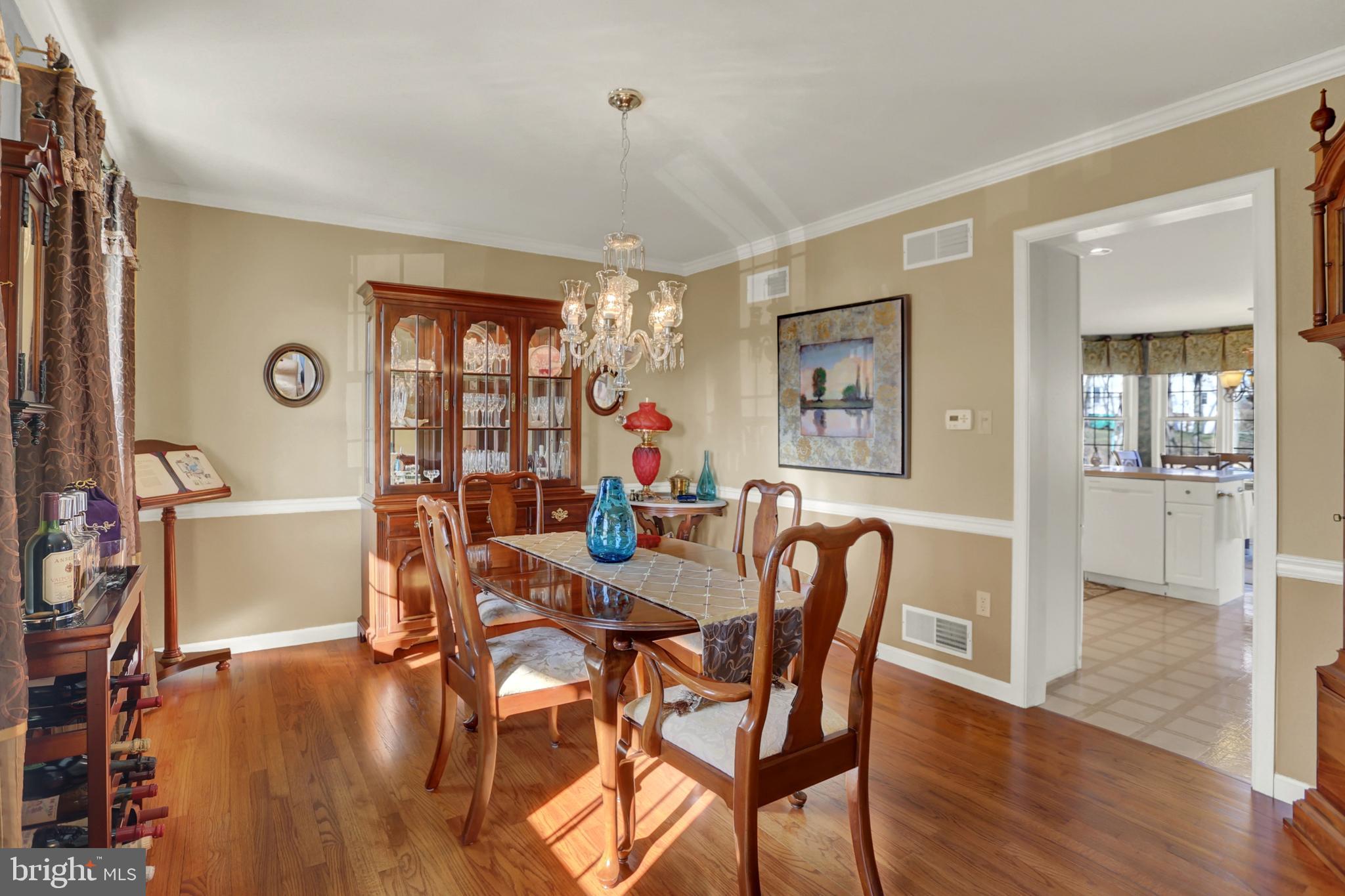 402 Hidden Valley Road New Cumberland, PA 17070 - Photo 18 of 50 a view of a dining room with furniture window and wooden floor