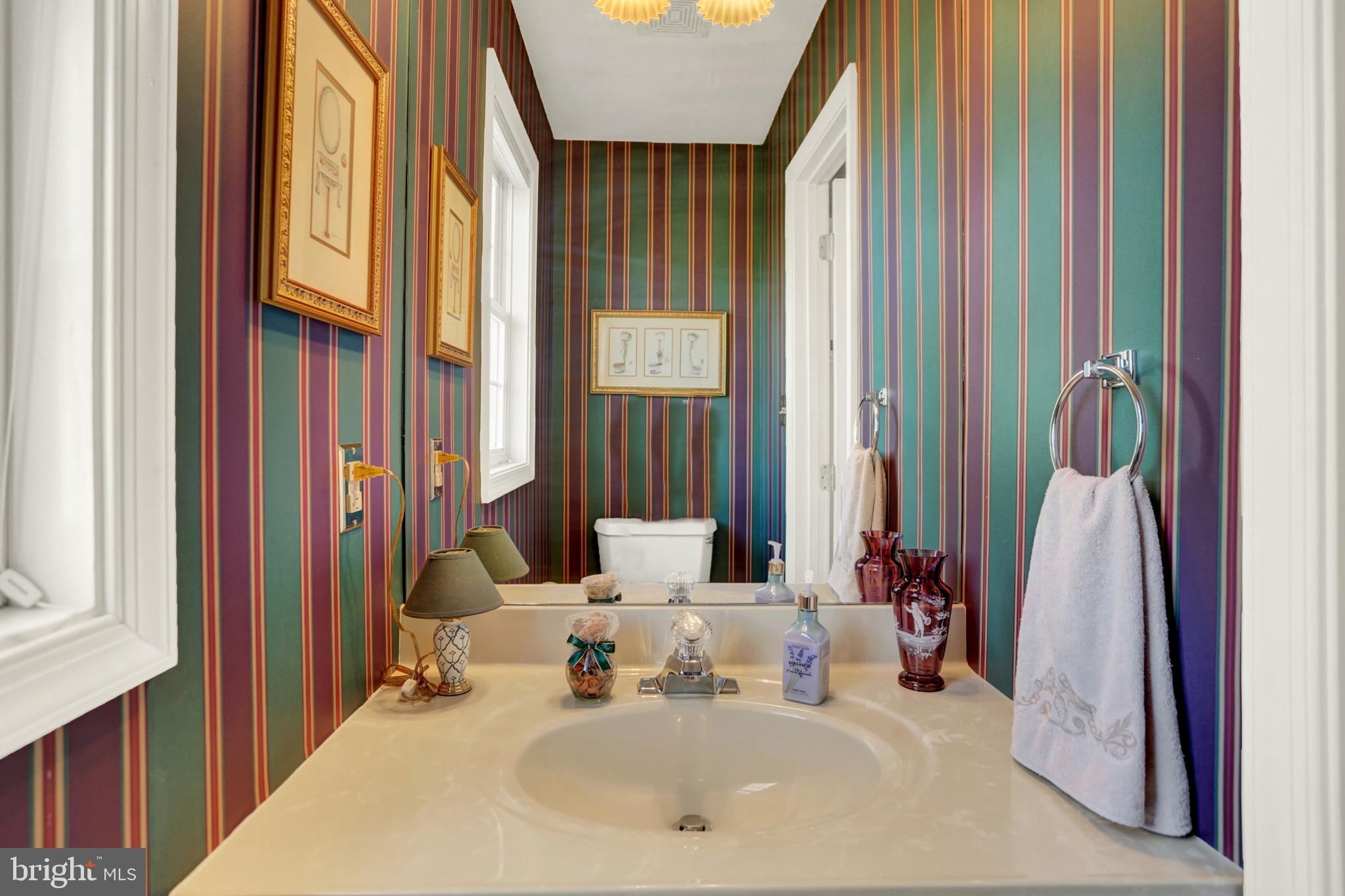 402 Hidden Valley Road New Cumberland, PA 17070 - Photo 19 of 50 a bathroom with a sink and a mirror