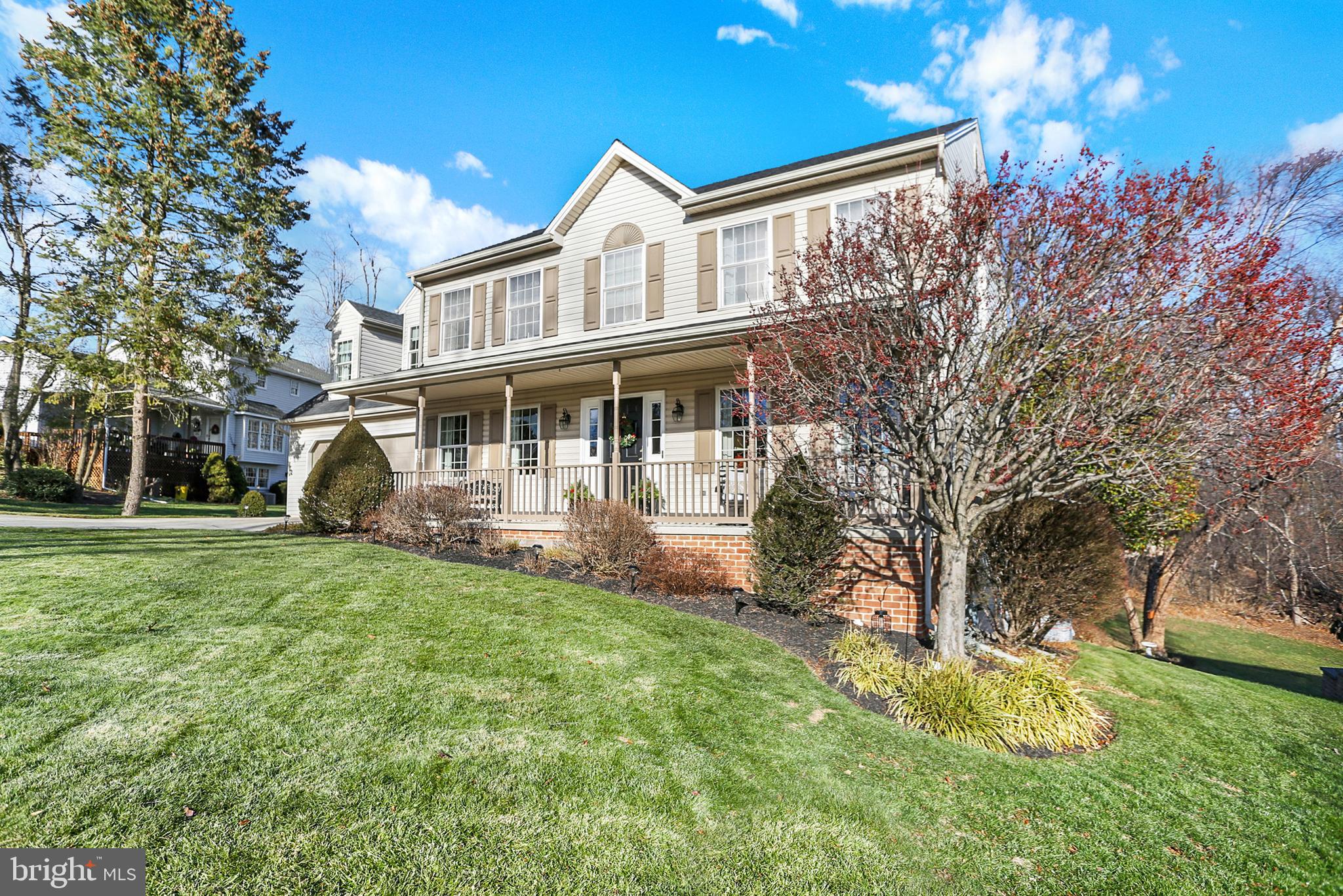 402 Hidden Valley Road New Cumberland, PA 17070 - Photo 2 of 50 a front view of a house with a yard