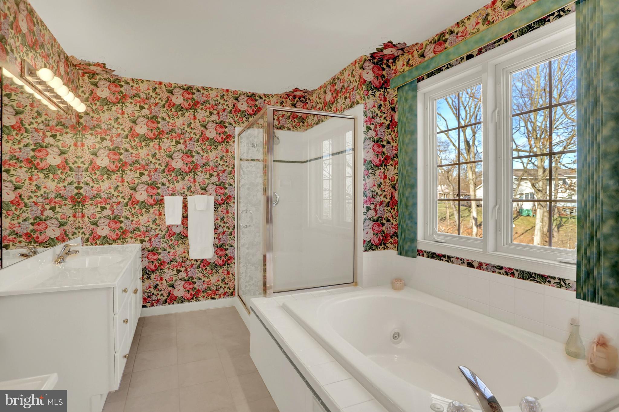 402 Hidden Valley Road New Cumberland, PA 17070 - Photo 24 of 50 a bathroom with a bathtub and a shower