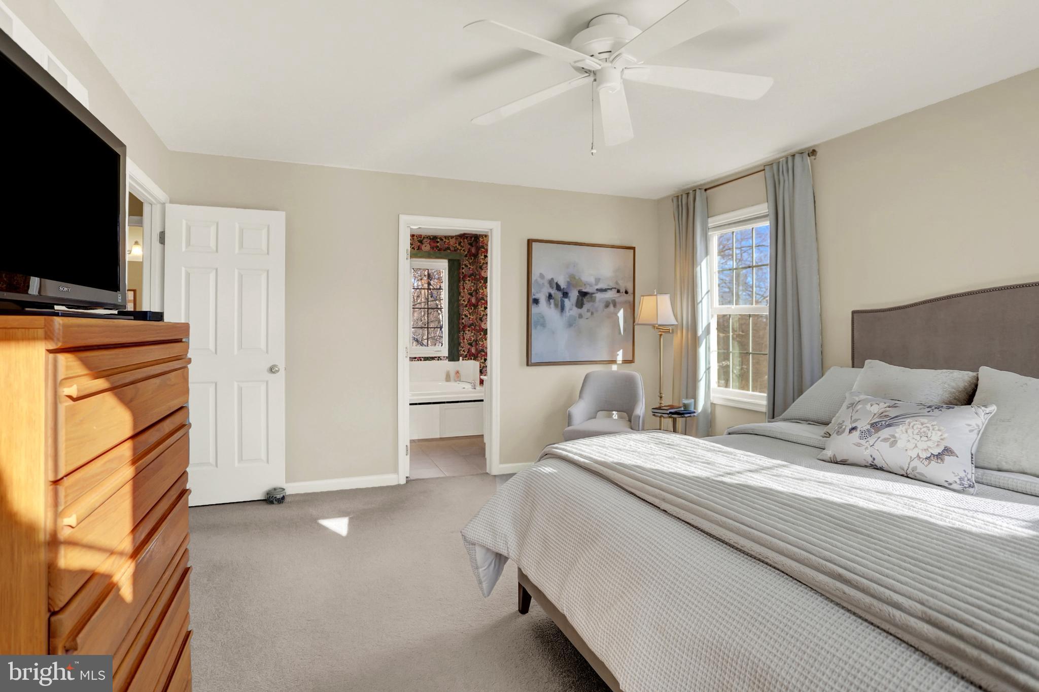 402 Hidden Valley Road New Cumberland, PA 17070 - Photo 27 of 50 a bedroom with a bed and a television