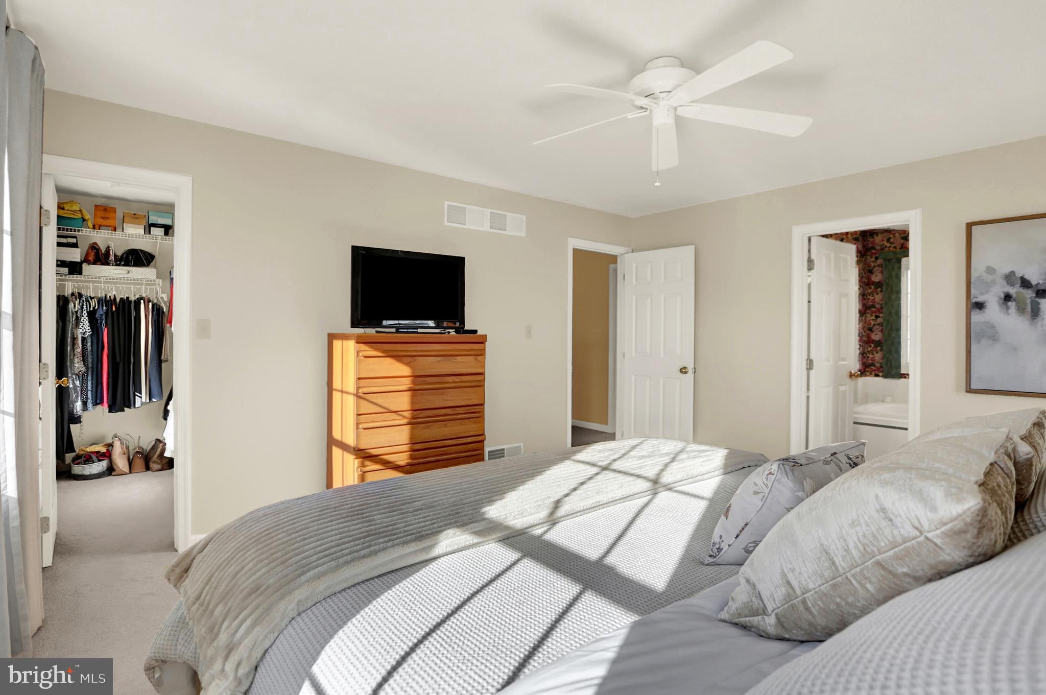 402 Hidden Valley Road New Cumberland, PA 17070 - Photo 28 of 50 a bedroom with a bed and a flat screen tv