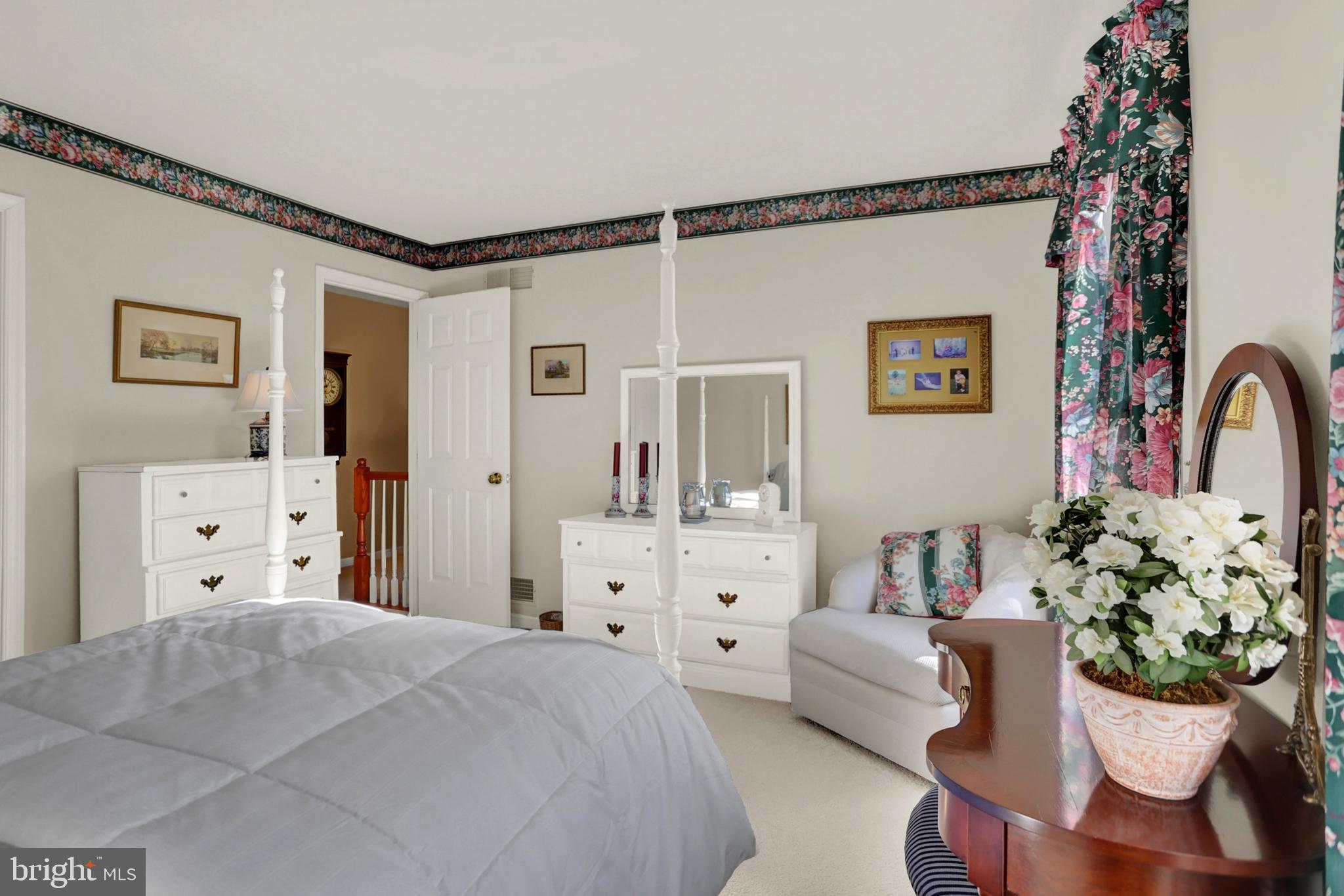 402 Hidden Valley Road New Cumberland, PA 17070 - Photo 34 of 50 a bed room with a bed and a dresser