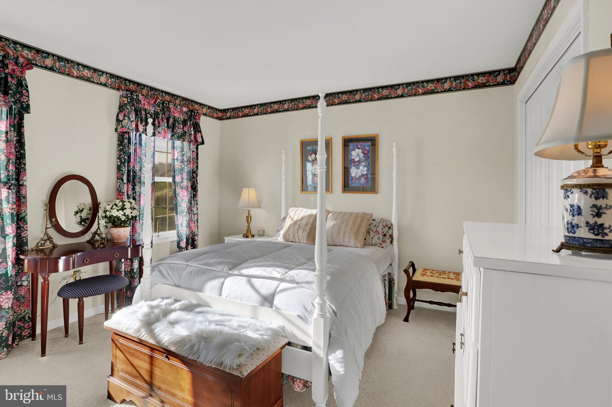 402 Hidden Valley Road New Cumberland, PA 17070 - Photo 35 of 50 a bedroom with a bed window and a table