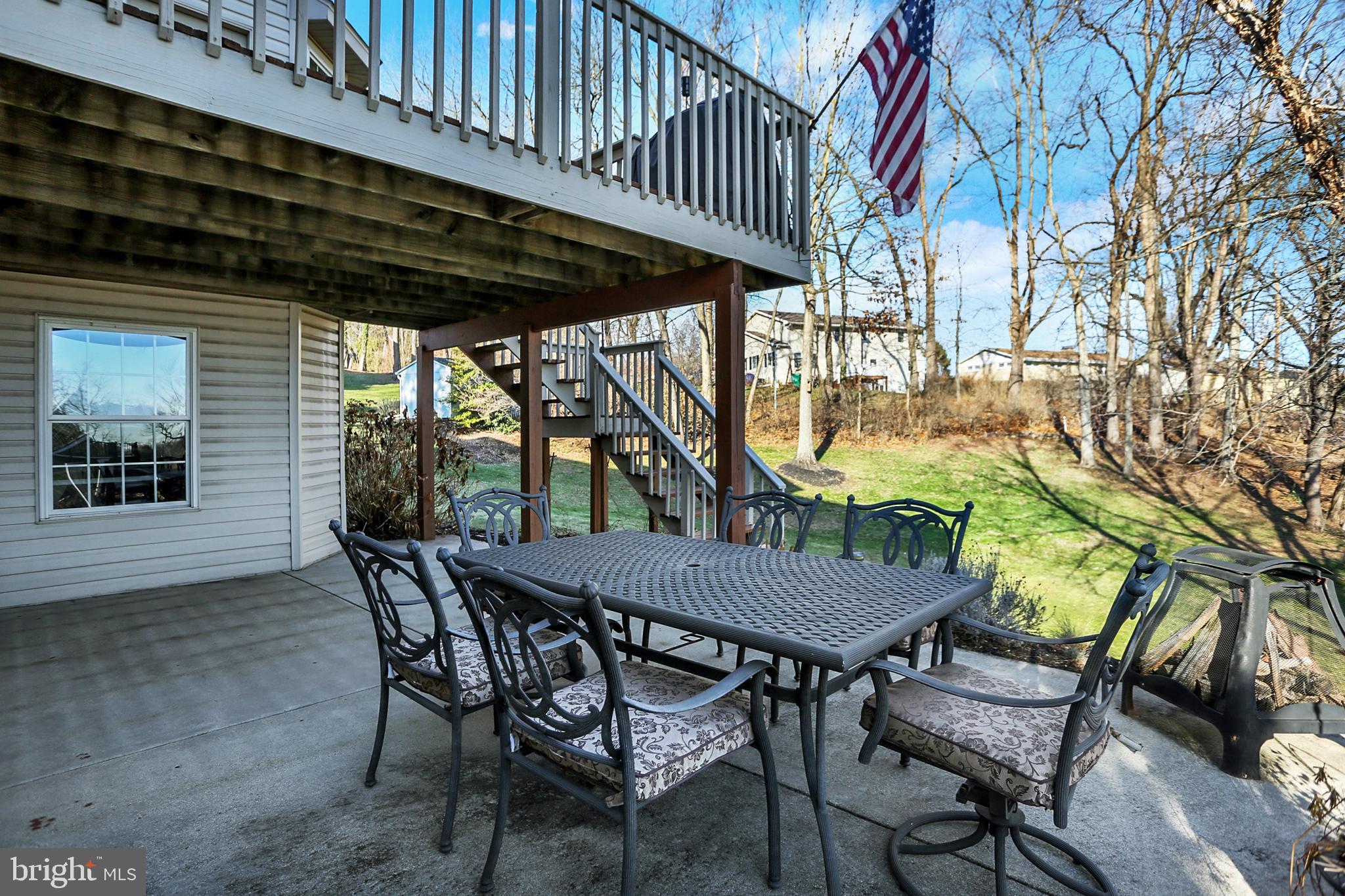 402 Hidden Valley Road New Cumberland, PA 17070 - Photo 41 of 50 a view of an outdoor dining space with a table and chairs
