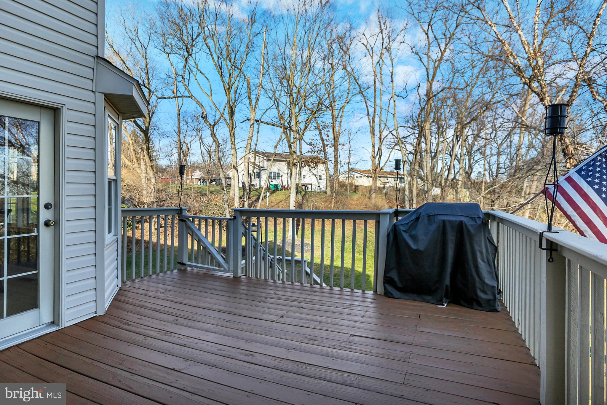 402 Hidden Valley Road New Cumberland, PA 17070 - Photo 44 of 50 a view of a balcony with wooden floor and fence