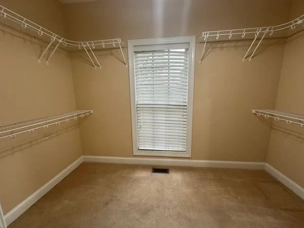 a view of a room that has a window in it