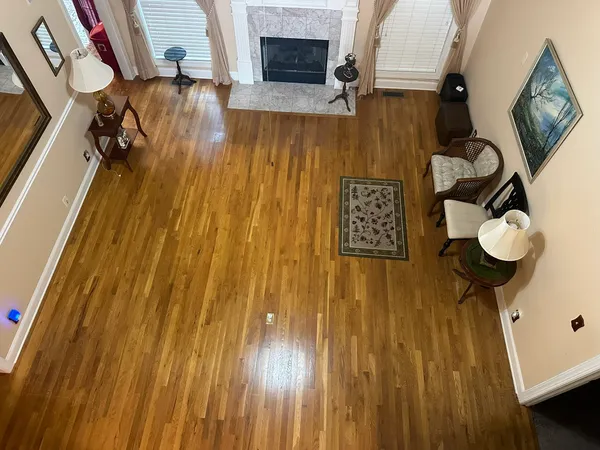 a view of staircase with wooden floor