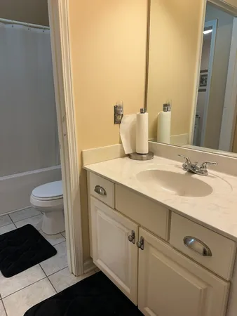 a room with gym equipment and a mirror