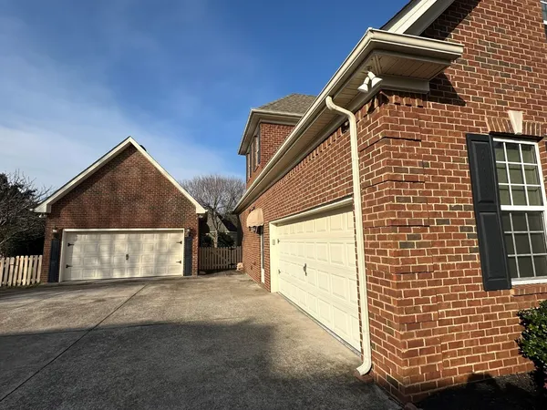 a view of a house with a garage