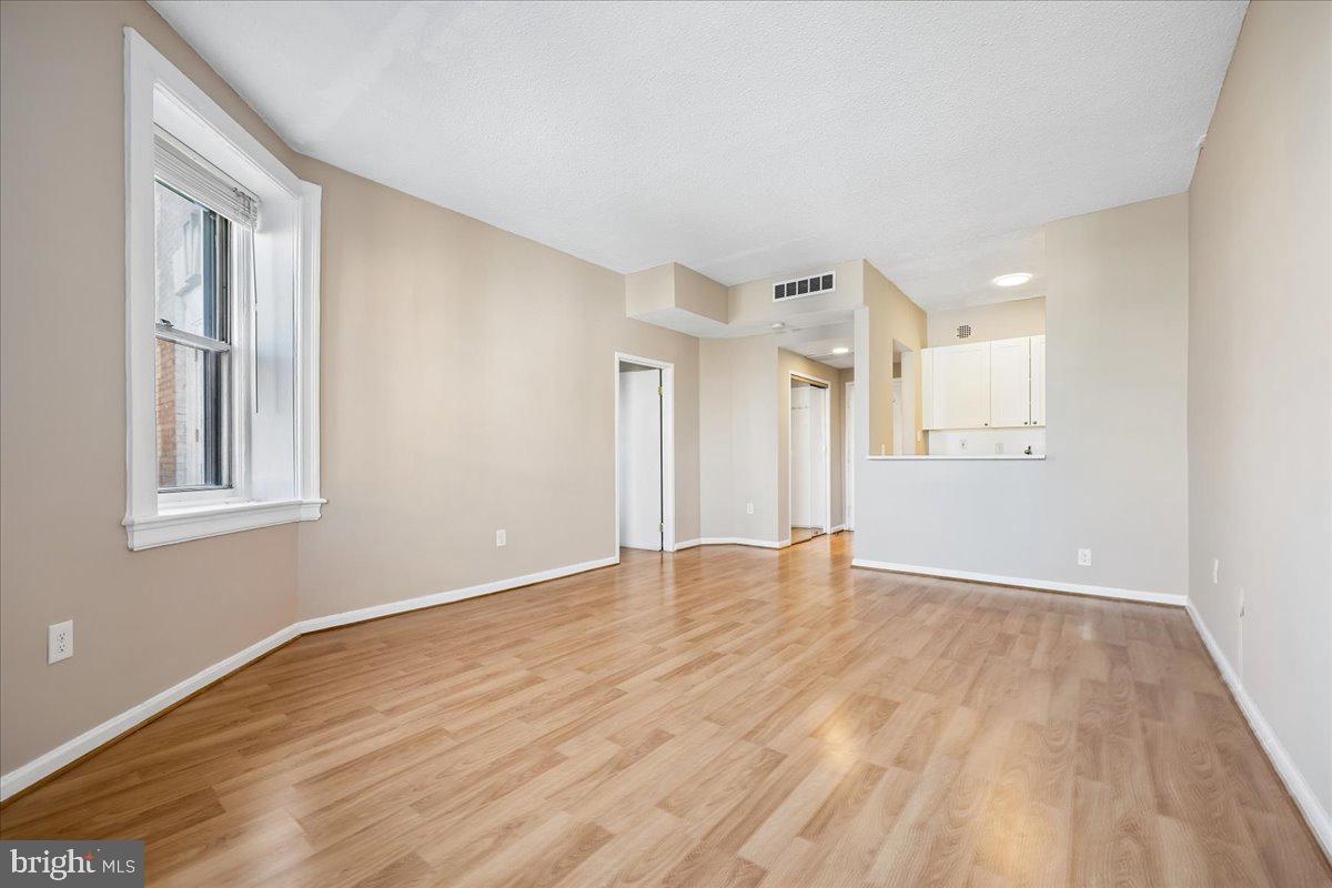 1851 Columbia Road Northwest, Unit 401 Washington, DC 20009 - Photo 13 of 32 Sunny Living area