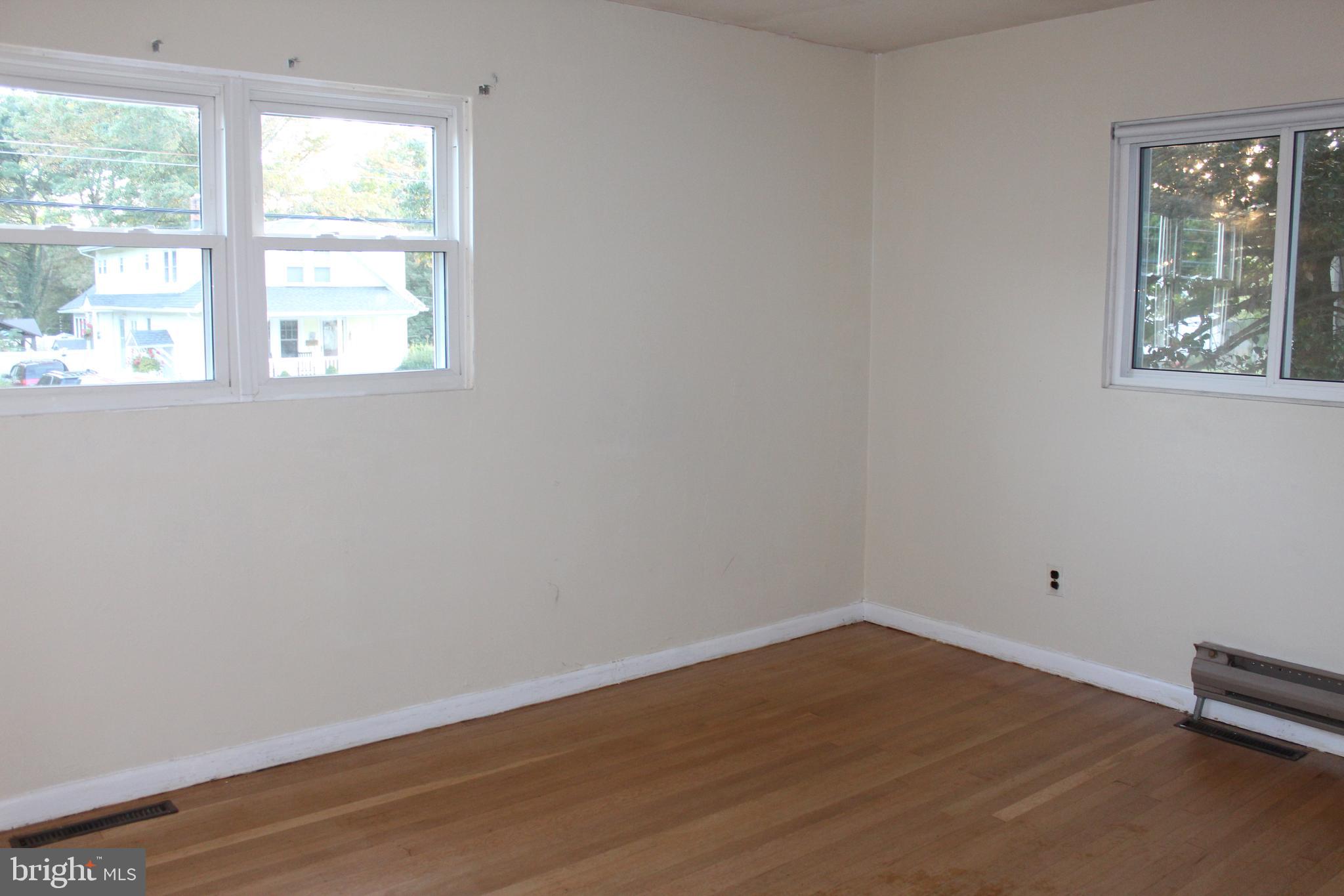 413 Dickinson Road Glassboro, NJ 08028 - Photo 11 of 16 an empty room with a window