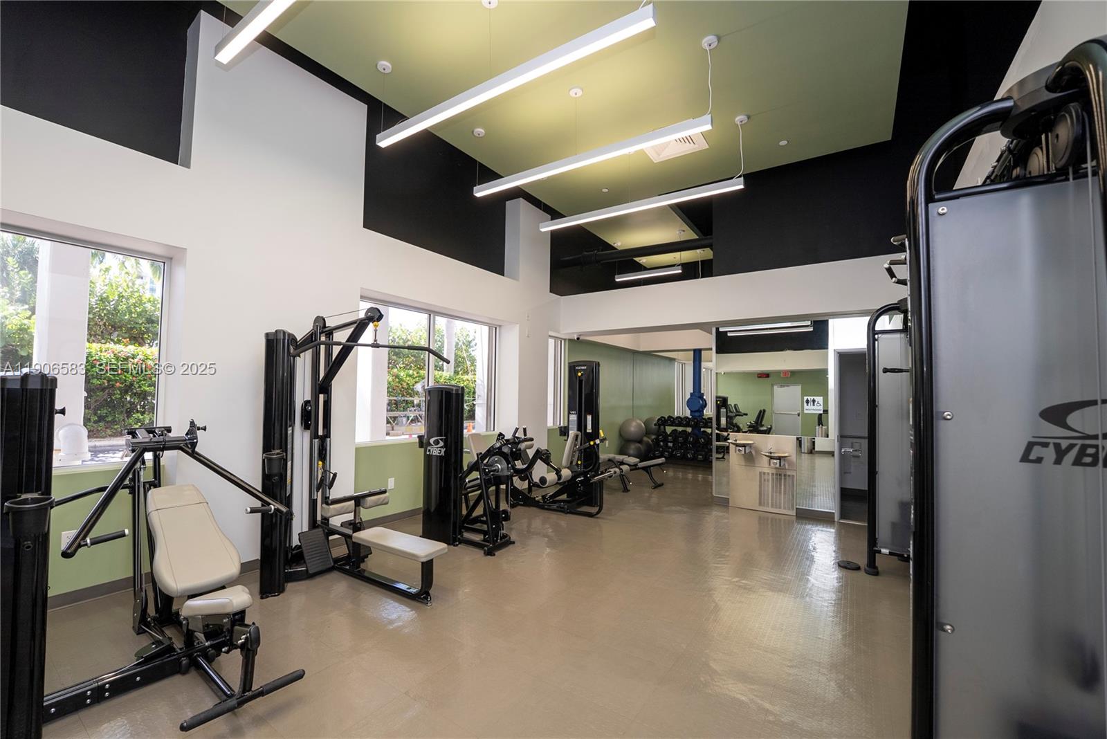 881 Ocean Drive, Unit TH15 Key Biscayne, FL 33149 - Photo 25 of 26 a view of a room with gym equipment