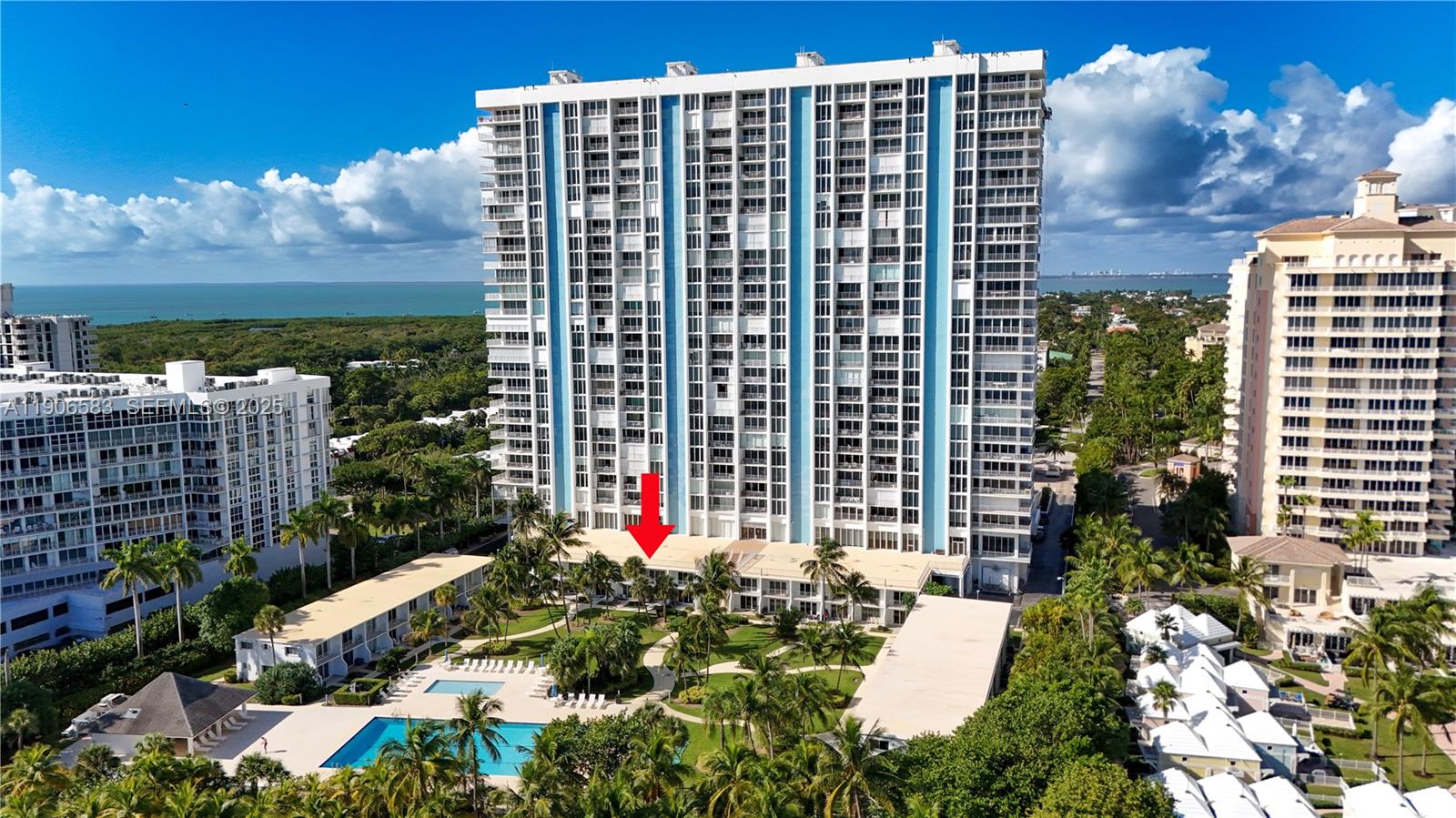 881 Ocean Drive, Unit TH15 Key Biscayne, FL 33149 - Photo 3 of 26 a view of a city with tall buildings