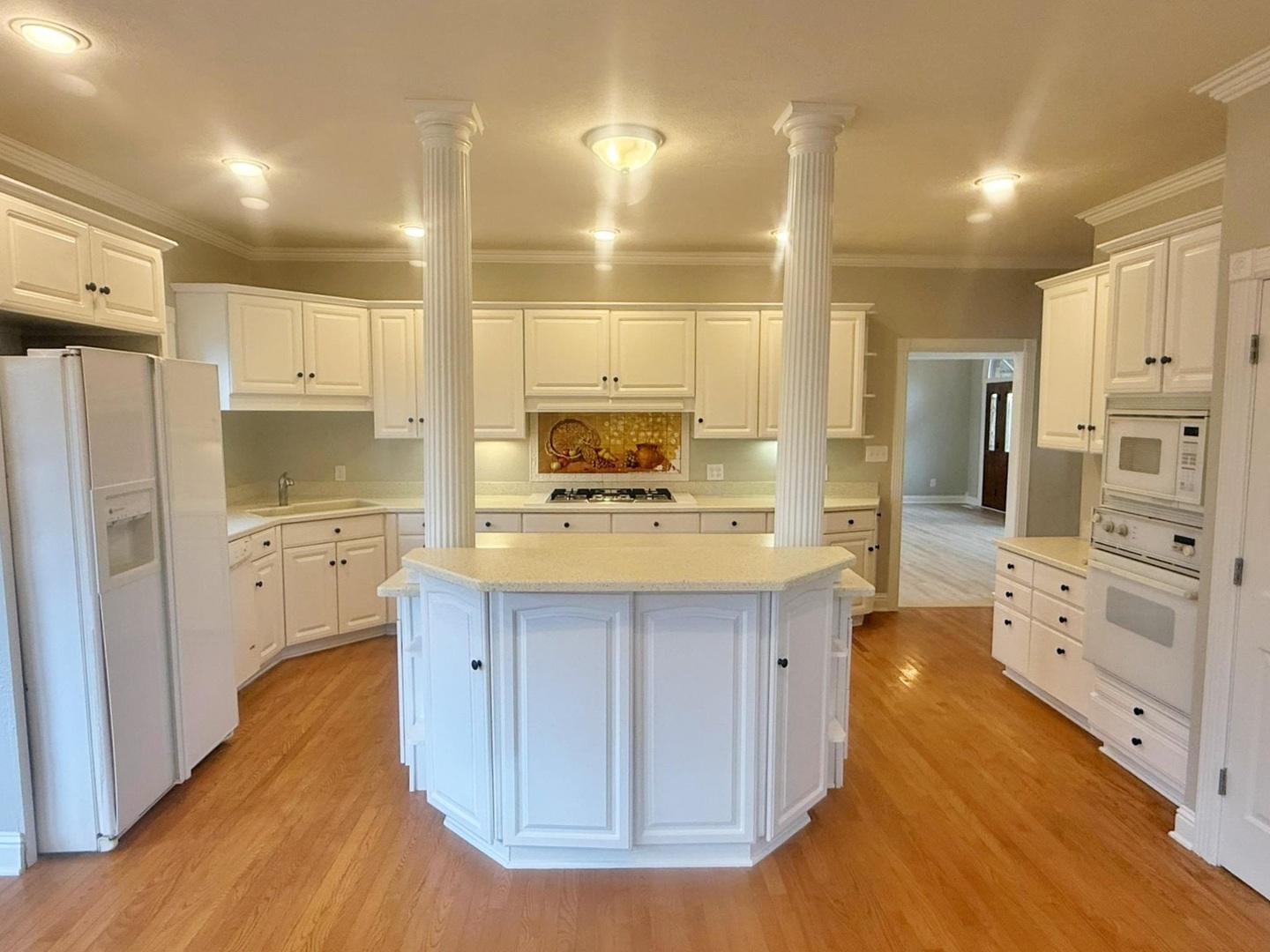 9 Hickory Lane Metropolis, IL 62960 - Photo 12 of 37 a kitchen with stainless steel appliances a refrigerator sink and cabinets