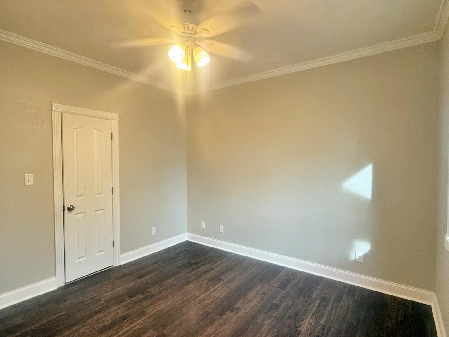 9 Hickory Lane Metropolis, IL 62960 - Photo 20 of 37 an empty room with wooden floor and fan