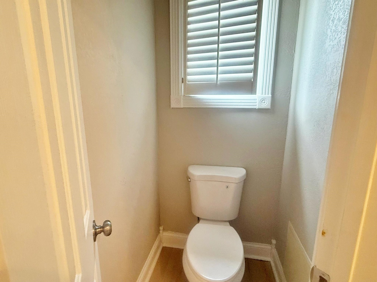 9 Hickory Lane Metropolis, IL 62960 - Photo 30 of 37 a white toilet sitting next to a bathroom sink
