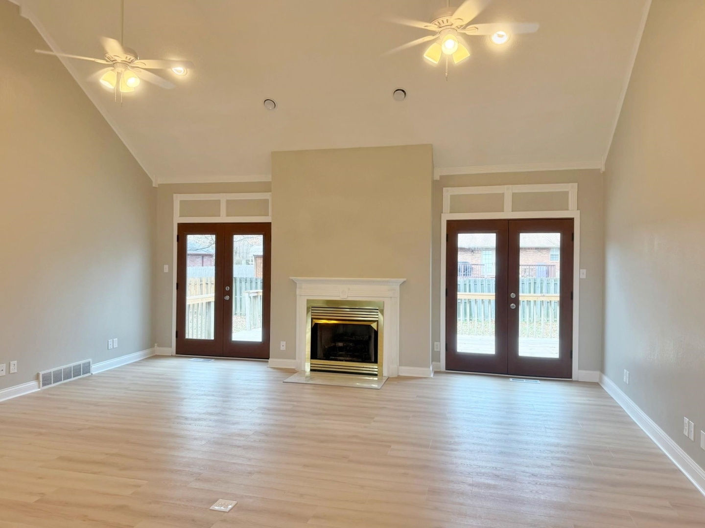 9 Hickory Lane Metropolis, IL 62960 - Photo 9 of 37 a view of an empty room with wooden floor and a window