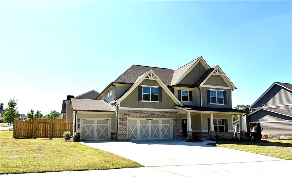 514 Adventure Trail Jefferson, GA 30549 - Photo 2 of 49 a front view of a house with a yard